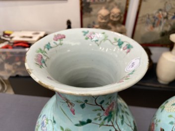 A pair of Chinese famille rose turquoise-ground vases with butterfly handles, 19th C.