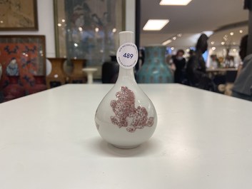 A small Chinese copper-red bottle vase with Buddhist lions, Kangxi