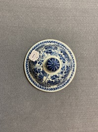 A Chinese blue and white vase and cover with floral design, Kangxi