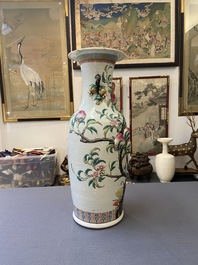 A Chinese famille rose molded 'nine peaches' vase, 19th C.