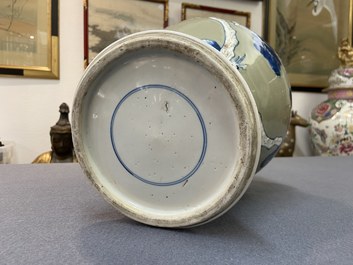 A Chinese blue, white and copper-red celadon-ground 'birds and deer' vase, Kangxi