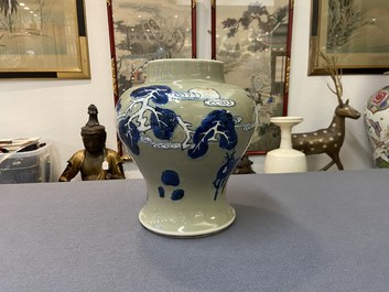 A Chinese blue, white and copper-red celadon-ground 'birds and deer' vase, Kangxi