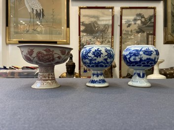 A pair of Chinese blue and white 'dragon' stem cups and one in copper-red, 19/20th C.