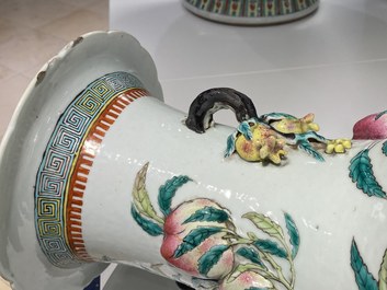 A Chinese famille rose molded 'nine peaches' vase, 19th C.