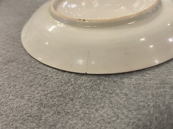 A Chinese famille rose 'harvesting' cup and saucer, Yongzheng