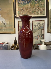 A Chinese monochrome sang de boeuf bottle vase, 19/20th C.