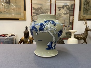 A Chinese blue, white and copper-red celadon-ground 'birds and deer' vase, Kangxi