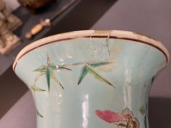 A pair of Chinese famille rose turquoise-ground vases with butterfly handles, 19th C.