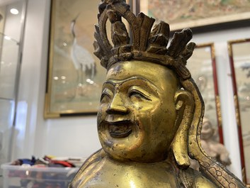 Une figure de Bouddha assis en bronze dor&eacute;, Chine, Ming