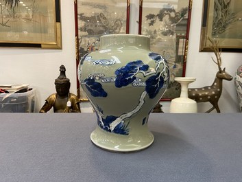 A Chinese blue, white and copper-red celadon-ground 'birds and deer' vase, Kangxi