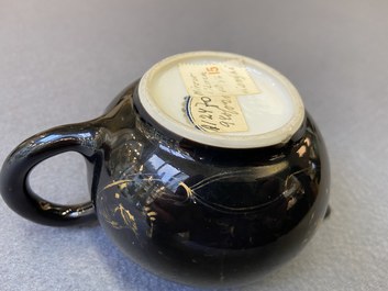 Four Chinese Yixing stoneware, blue and white and monochrome black porcelain teapots, Kangxi and later