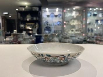 A Chinese doucai saucer, Yongzheng mark, 19/20th C.
