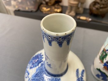 A Chinese wucai rouleau vase and a blue, white and copper-red vase, 19/20th C.