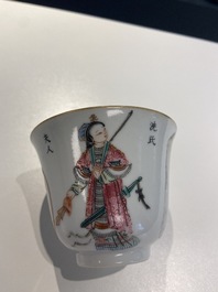 Une tasse couverte et soucoupe en porcelaine de Chine famille rose &agrave; d&eacute;cor 'Wu Shuang Pu', marque et &eacute;poque de Daoguang