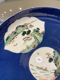 A Chinese famille verte powder blue-ground dish, 19th C.