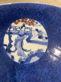 A Chinese blue, white and copper-red powder-blue-ground dish, Kangxi