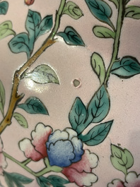 A Chinese pink-ground famille rose rouleau vase, 19th C.