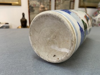 A Chinese wucai rouleau vase and a blue, white and copper-red vase, 19/20th C.