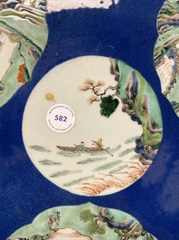 A Chinese famille verte powder blue-ground dish, 19th C.