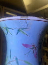 A pair of Chinese famille rose turquoise-ground vases with butterfly handles, 19th C.