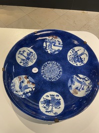 A Chinese blue, white and copper-red powder-blue-ground dish, Kangxi