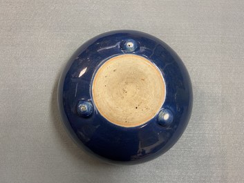 A Chinese monochrome blue censer and a white slip-decorated celadon vase, 18/19th C.