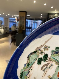 A Chinese famille verte powder blue-ground dish, 19th C.
