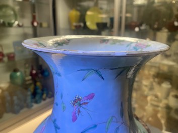 A pair of Chinese famille rose turquoise-ground vases with butterfly handles, 19th C.