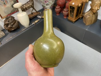 A Chinese monochrome teadust-glazed bottle vase, 19th C.