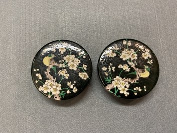 A pair of Chinese famille noire jars and covers, 19th C.