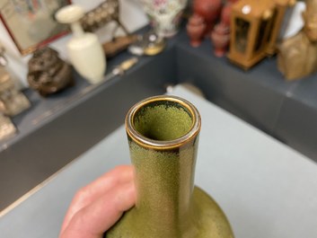 A Chinese monochrome teadust-glazed bottle vase, 19th C.