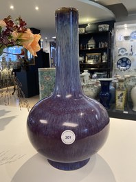 A Chinese flamb&eacute;-glazed bottle vase, Kangxi mark, 19th C.