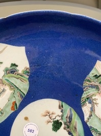 A Chinese famille verte powder blue-ground dish, 19th C.