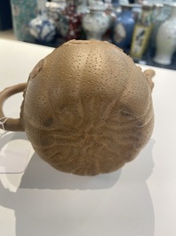 A Chinese Yixing stoneware teapot with squirrels and butterflies, seal mark, 18th C.