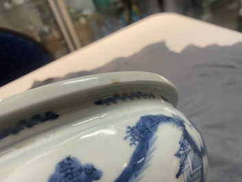 A Chinese blue and white tripod censer with figures in a mountainous landscape, Kangxi