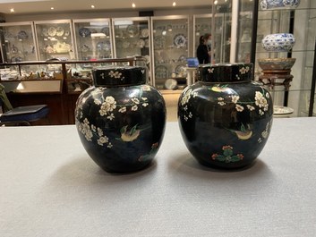 A pair of Chinese famille noire jars and covers, 19th C.