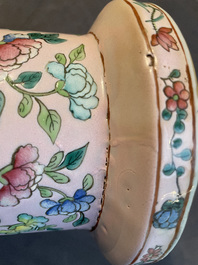 A Chinese pink-ground famille rose rouleau vase, 19th C.