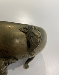 Un br&ucirc;le-parfum en bronze aux anses et pieds en forme d'&eacute;l&eacute;phants, Chine, marque et &eacute;poque de Qianlong