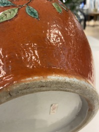 A Chinese famille rose 'sanduo' vase with applied design on a coral red ground, 19th C.