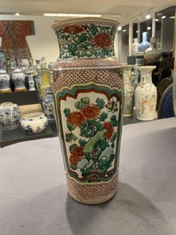 A Chinese wucai vase with floral panels, Transitional period