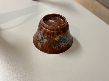 A pair of Chinese famille rose 'faux-bois' cups and saucers, Yongzheng/Qianlong