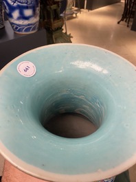A Chinese famille rose blue-ground 'bajixiang' vase, 19th C.