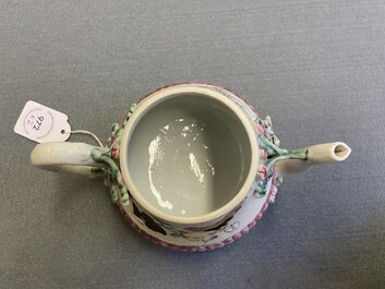 A pair of Chinese famille rose teapots and covers with applied design, Yongzheng