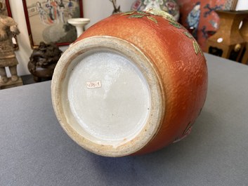 A Chinese famille rose 'sanduo' vase with applied design on a coral red ground, 19th C.