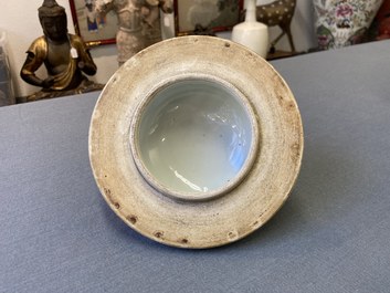 A Chinese gilt-heightened blue and white vase and cover, Kangxi/Yongzheng