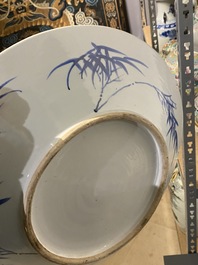A Chinese famille verte 'yenyen' 'rice production' vase and a large blue and white 'peacock' dish, 19th C.
