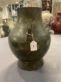 A Chinese archaistic bronze 'hu' vase with inscription, Ming