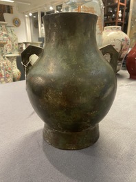 A Chinese archaistic bronze 'hu' vase with inscription, Ming