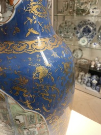 A Chinese famille verte powder blue-ground vase and a famille rose vase, 19th C.