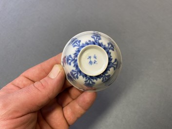 Three Chinese blue and white cups and two saucers, Kangxi